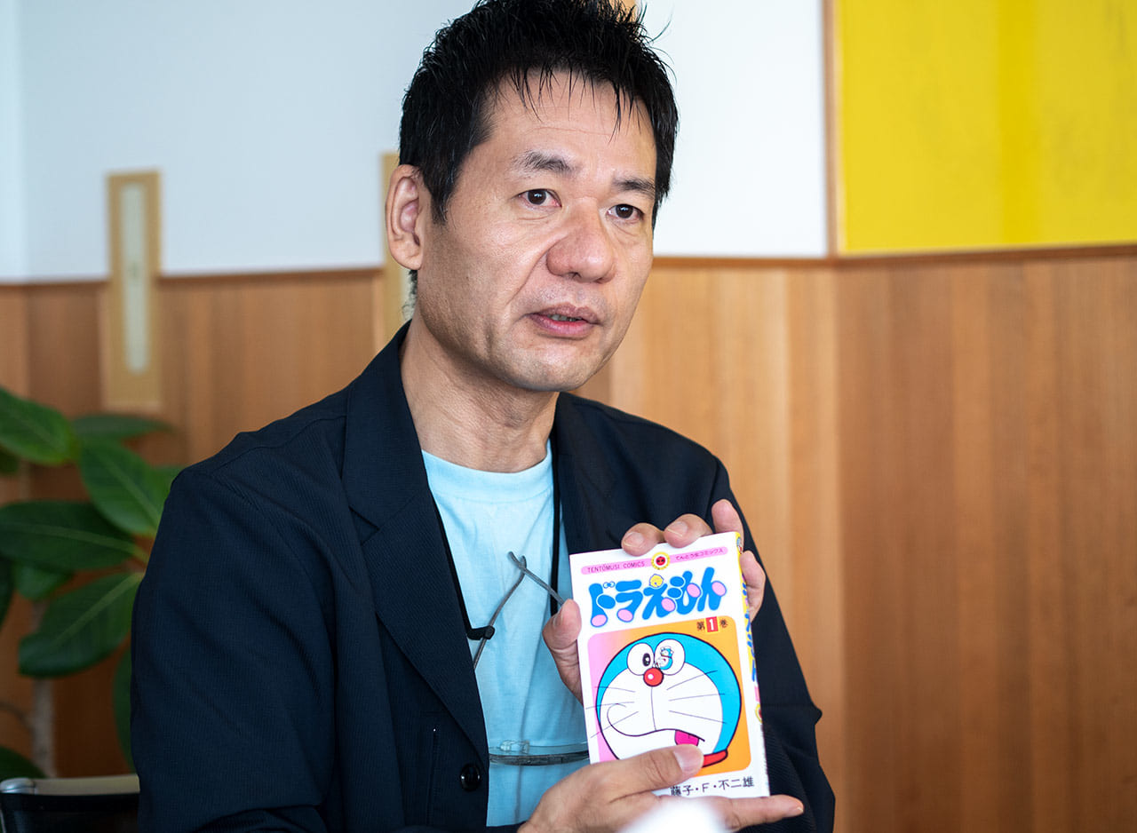 ▲小学館・ドラえもんルームの徳山さん。