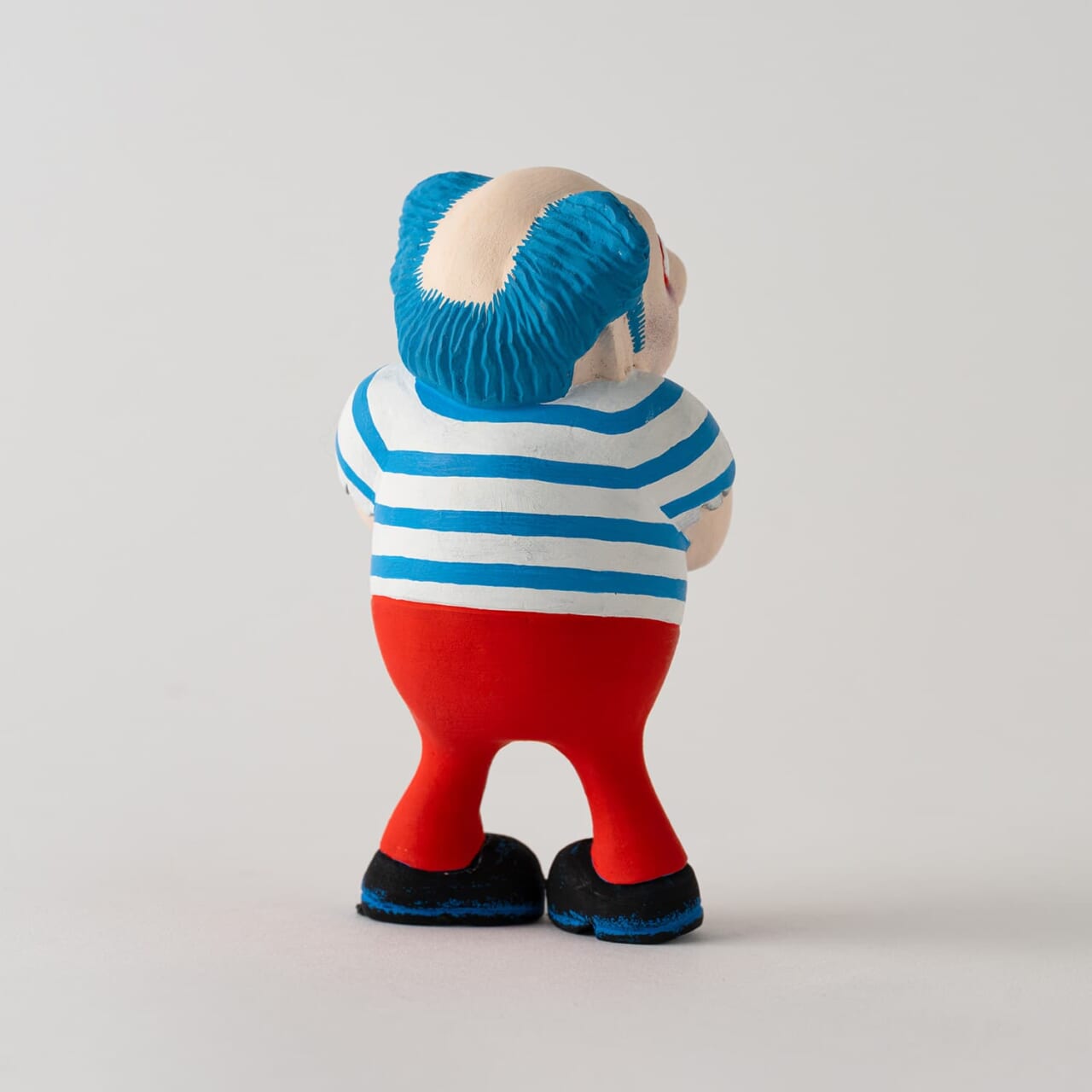 △『MOTHER』のキャラ「だっそうはん」の後ろ姿。