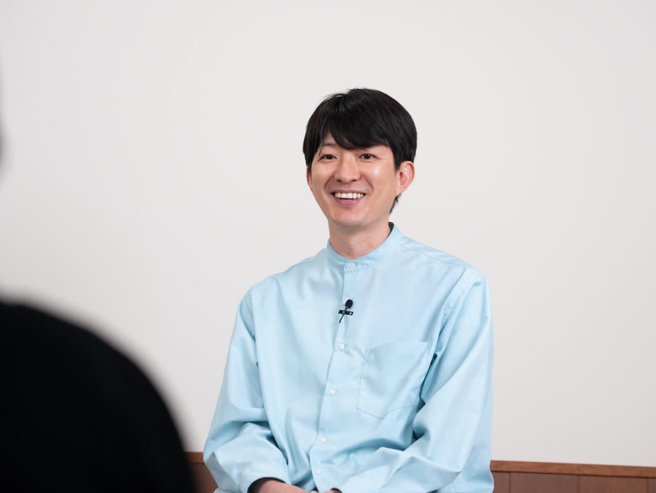 インタビューを受けている澤田さん