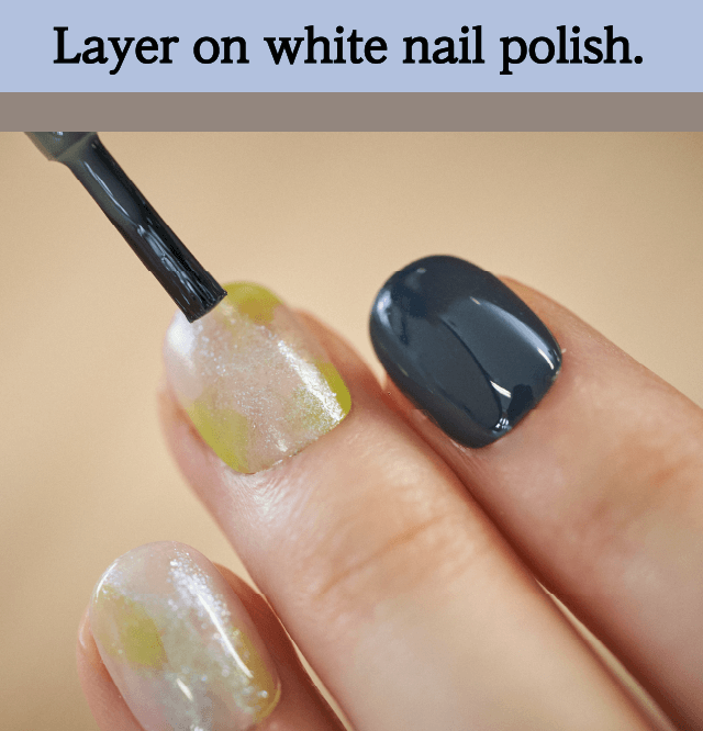 Layer on white nail polish.