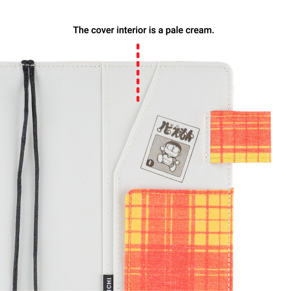 The cover interior is a pale cream.