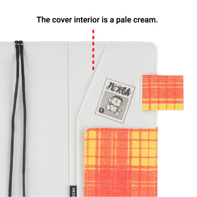 The cover interior is a pale cream.