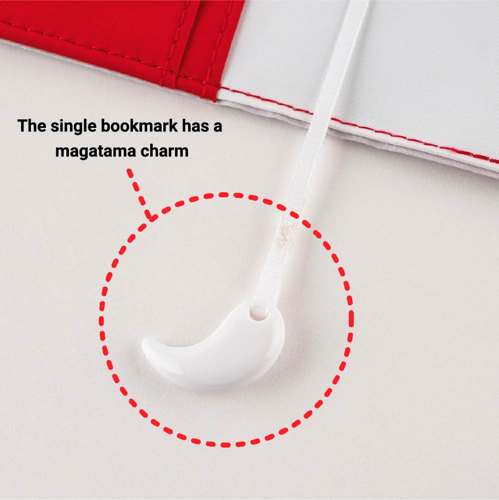 The single bookmark has a magatama charm